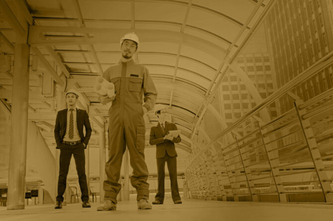 Contractor construction engineer meeting together architect tabl